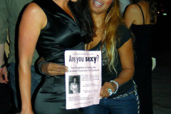 MAVRIXPHOTO.COM Are you sexy? Traci Bingham promotes her new reality show "American Sex Symbol" by holding up a flyer with a sexy lady outside the nightclub Villa. The sign reads: "Are you Sexy? Traci Bingham is looking for the newest American Sex Symbol! Traci Bingham (Baywatch, Playboy) is looking for contestants for her new reality show American Sex Symbol. If you think you're sexy, she wants you!" Are you sexy enough? She's looking for females of all ethnicities between the ages of 21 and 65. Los Angeles, CA. 7/18/08. Byline and/or web usage link must read MAVRIXPHOTO.COM Failure to byline correctly will incur double the agreed fee.