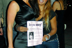 MAVRIXPHOTO.COM Are you sexy? Traci Bingham promotes her new reality show "American Sex Symbol" by holding up a flyer with a sexy lady outside the nightclub Villa. The sign reads: "Are you Sexy? Traci Bingham is looking for the newest American Sex Symbol! Traci Bingham (Baywatch, Playboy) is looking for contestants for her new reality show American Sex Symbol. If you think you're sexy, she wants you!" Are you sexy enough? She's looking for females of all ethnicities between the ages of 21 and 65. Los Angeles, CA. 7/18/08.
Byline and/or web usage link must read MAVRIXPHOTO.COM  Failure to byline correctly will incur double the agreed fee.