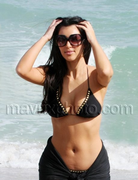 4_16_10_Kim Kourtney Kristin Beachside_1.jpg