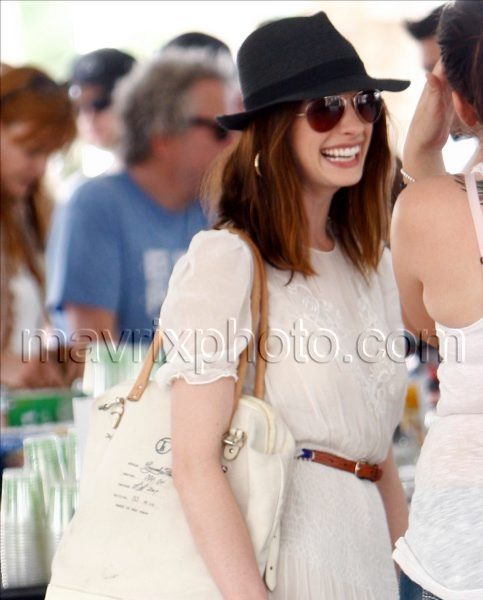 4_19_10_Anne Hathaway Summery Coachella_1.jpg