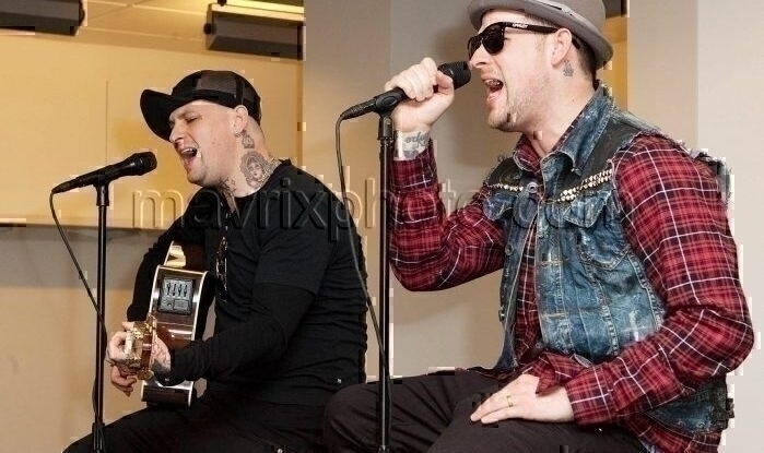 1_15_11_joel-and-benji-madden-macys_105